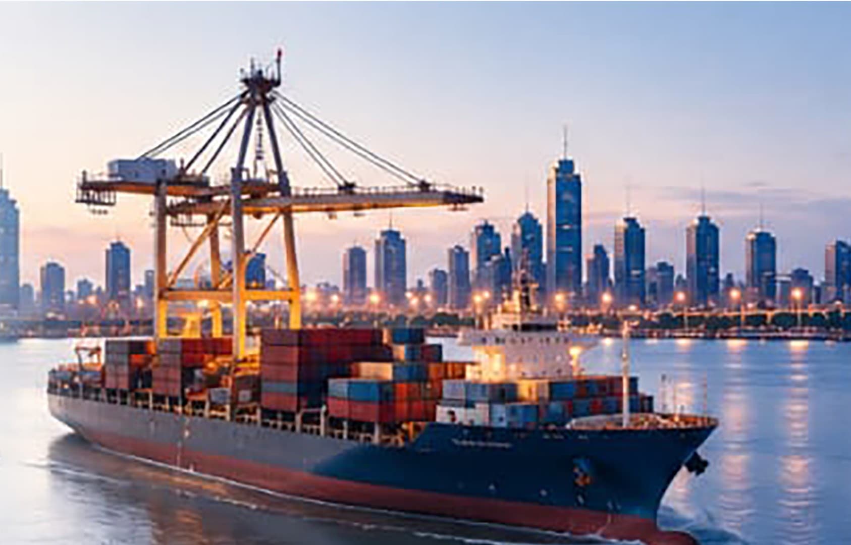 Container ship berthed at a Congolese port at dusk